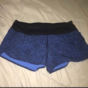 black and blue polka dotted lululemon shorts